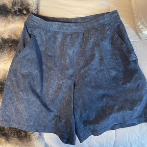 Mens blue and white printed lululemon shorts. Size L